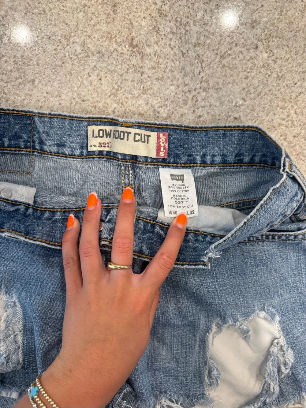 Levi's Distressed Blue Denim Shorts with Frayed Hem - Picture 2 of 3